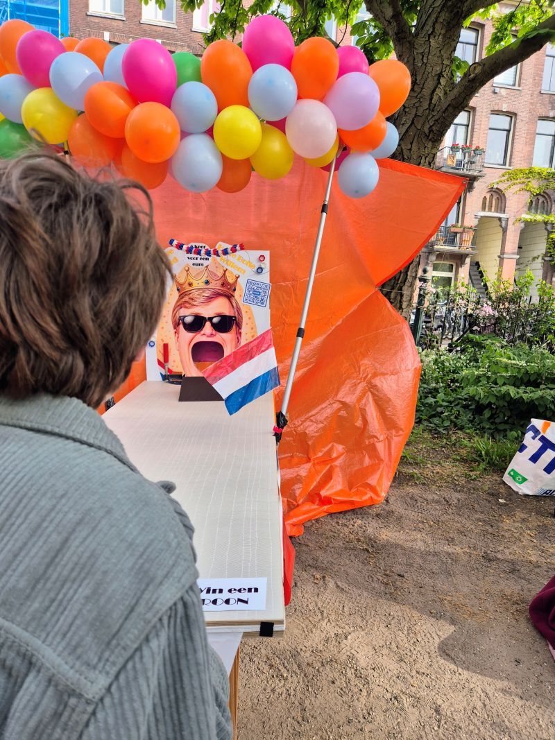 Earning money on King's Day with a lucky draw.