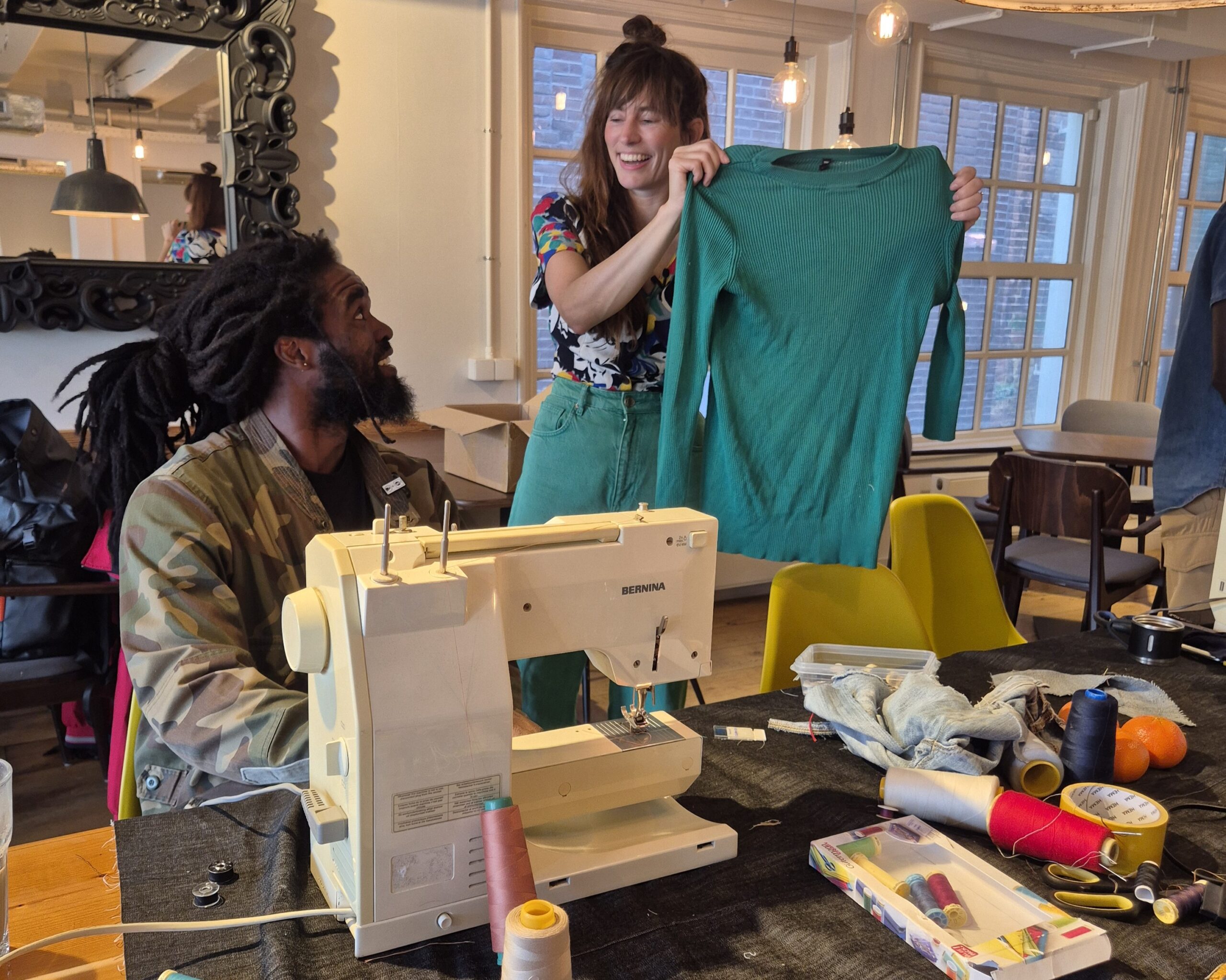 Clothes repair in Amsterdam City Centre, Kalverstraat.